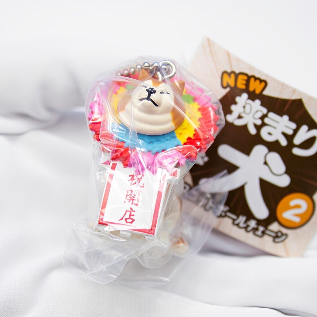 商品名 : NEW 挟まり犬 2 マスコットボールチェーン
